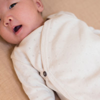 newborn_cross-over_body_pointelle_detail_oatmeal.jpg